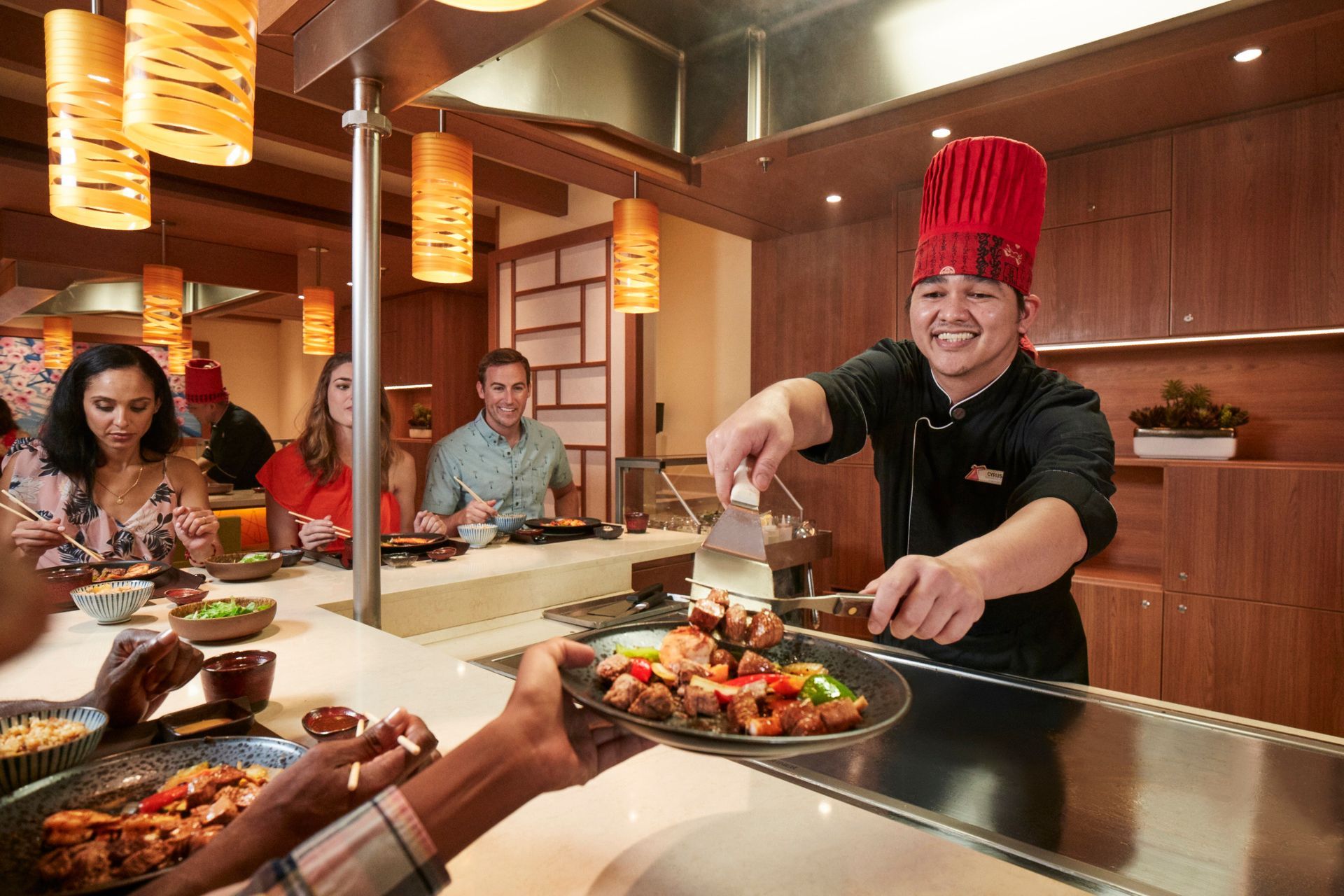 Teppanyaki Chef serving at Bonsai to guests