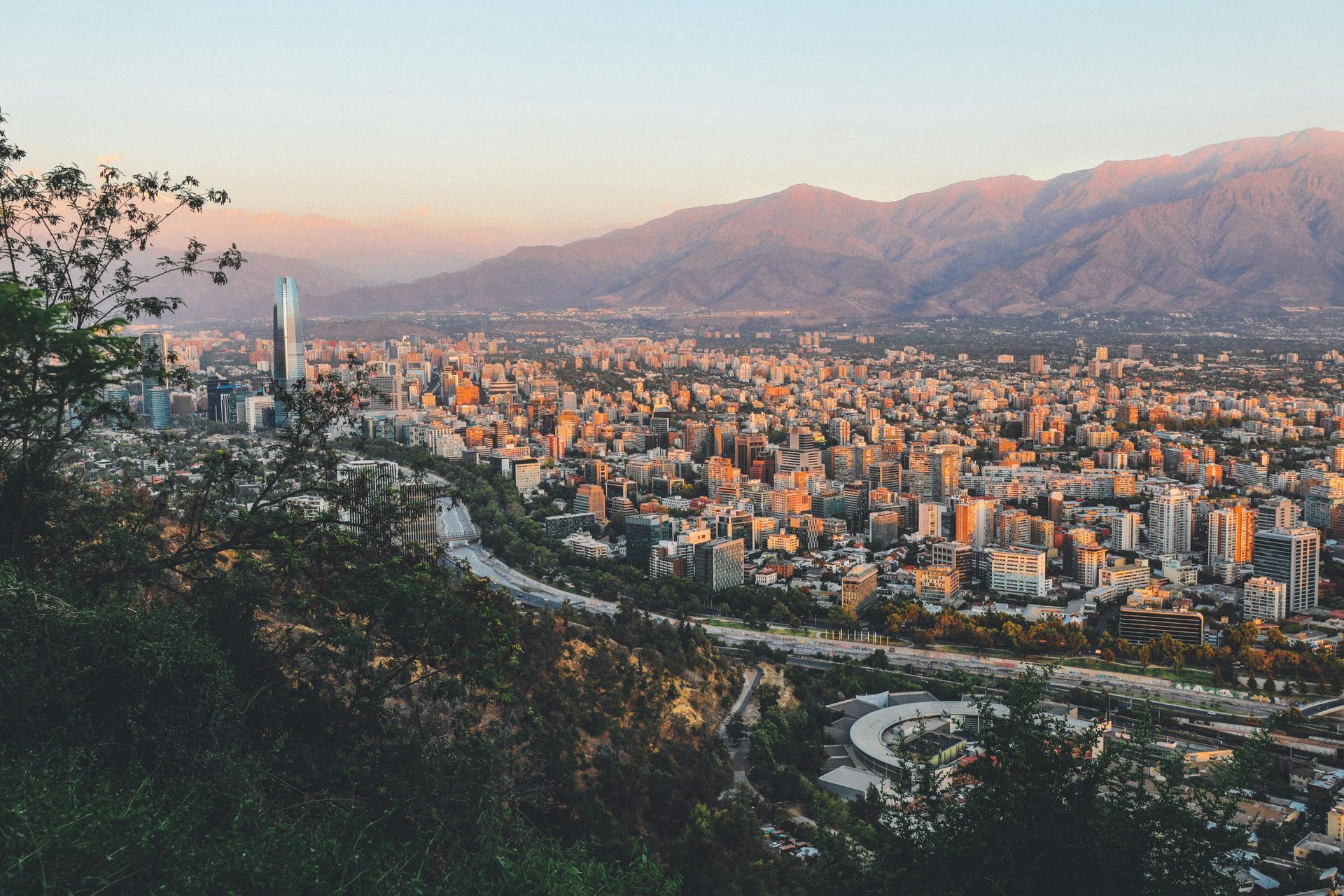 City of Santiago, Chile, at sunset, with mountains in the background.