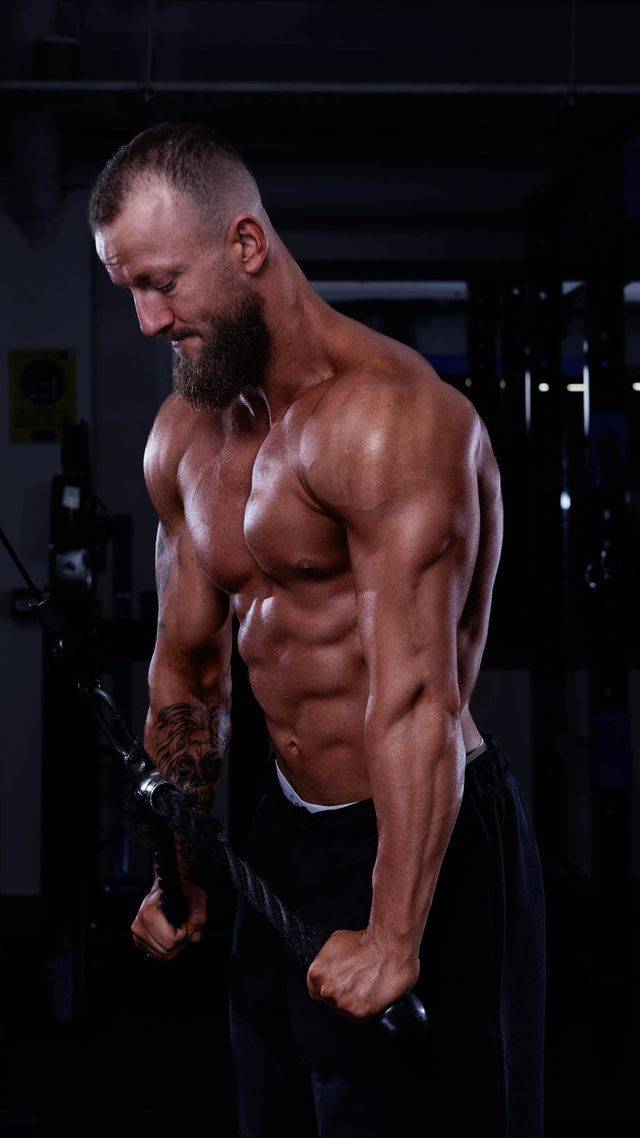 Jamie Beadle of JC Fitness Cork using a tricep rope pull down