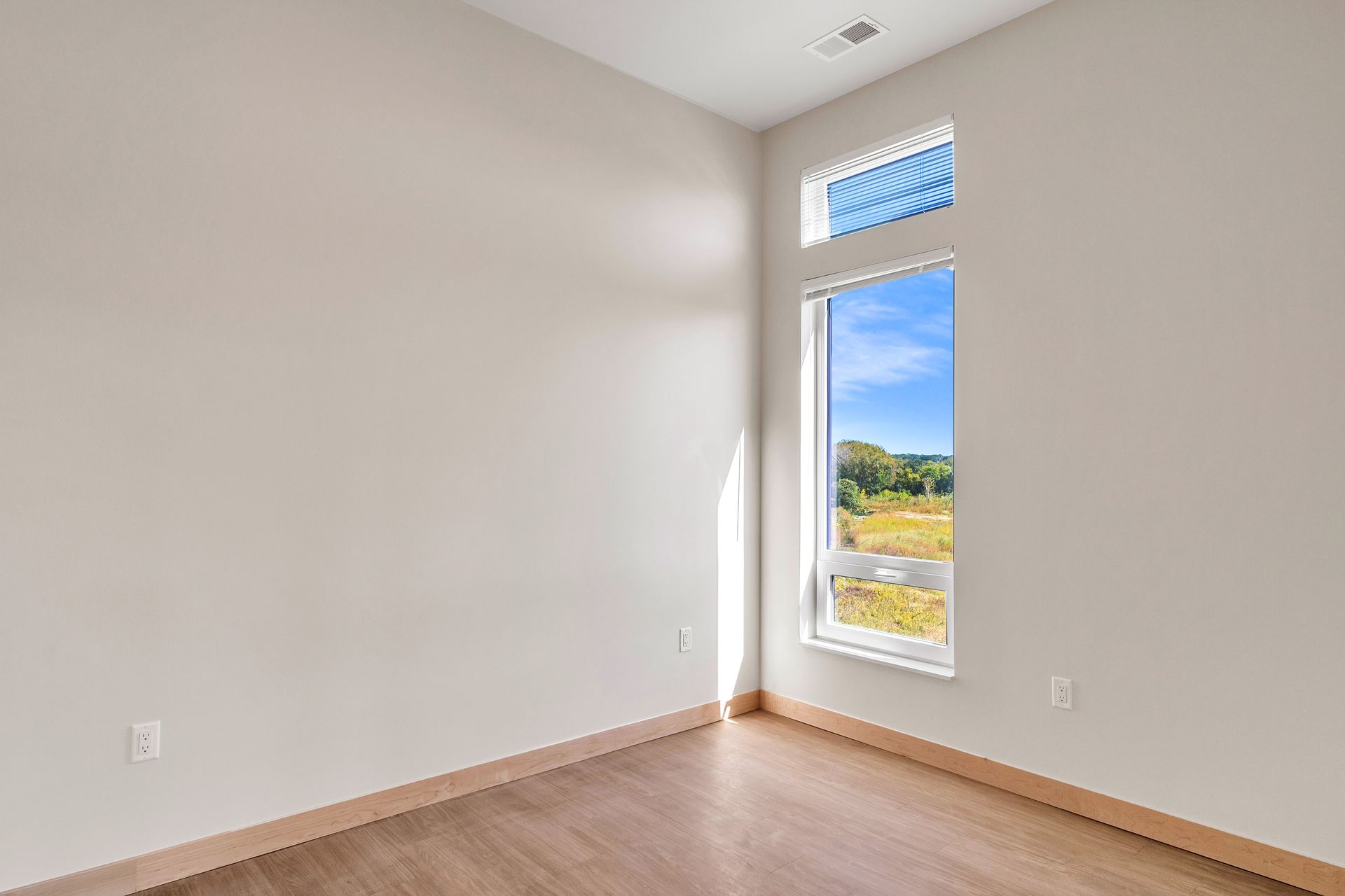 There is a large window in the middle of the room.