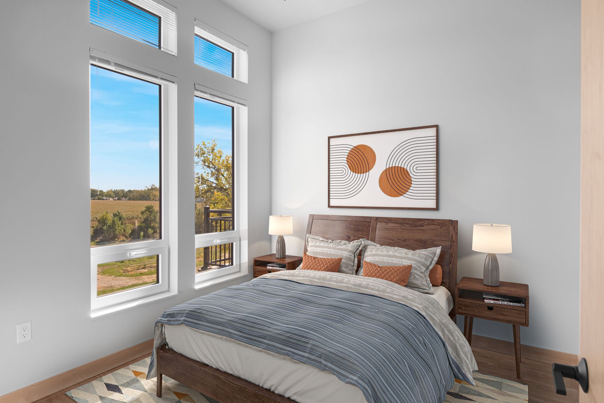 An artist 's impression of a bedroom with a bed , two windows and a rug.