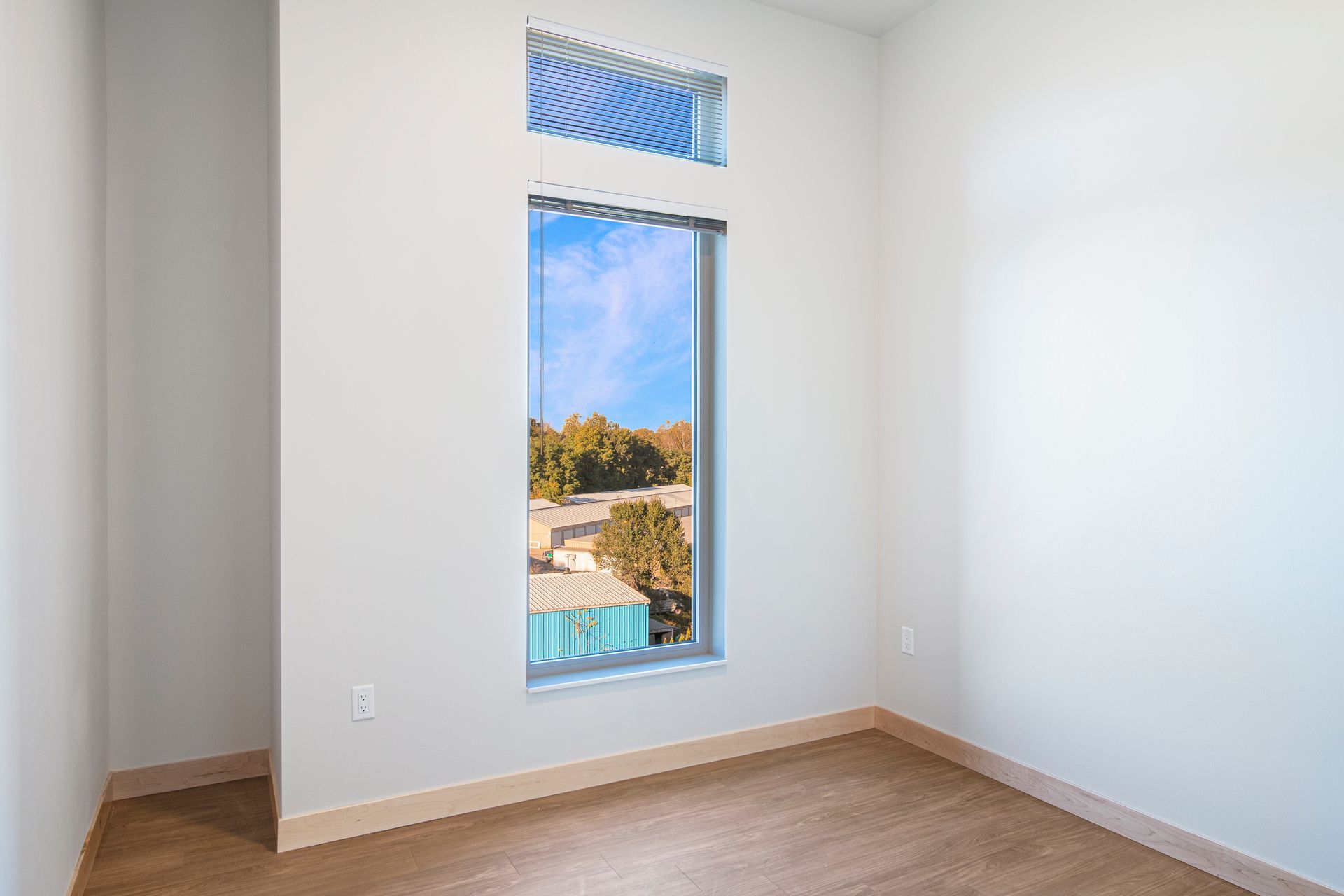 There is a large window in the middle of the room.