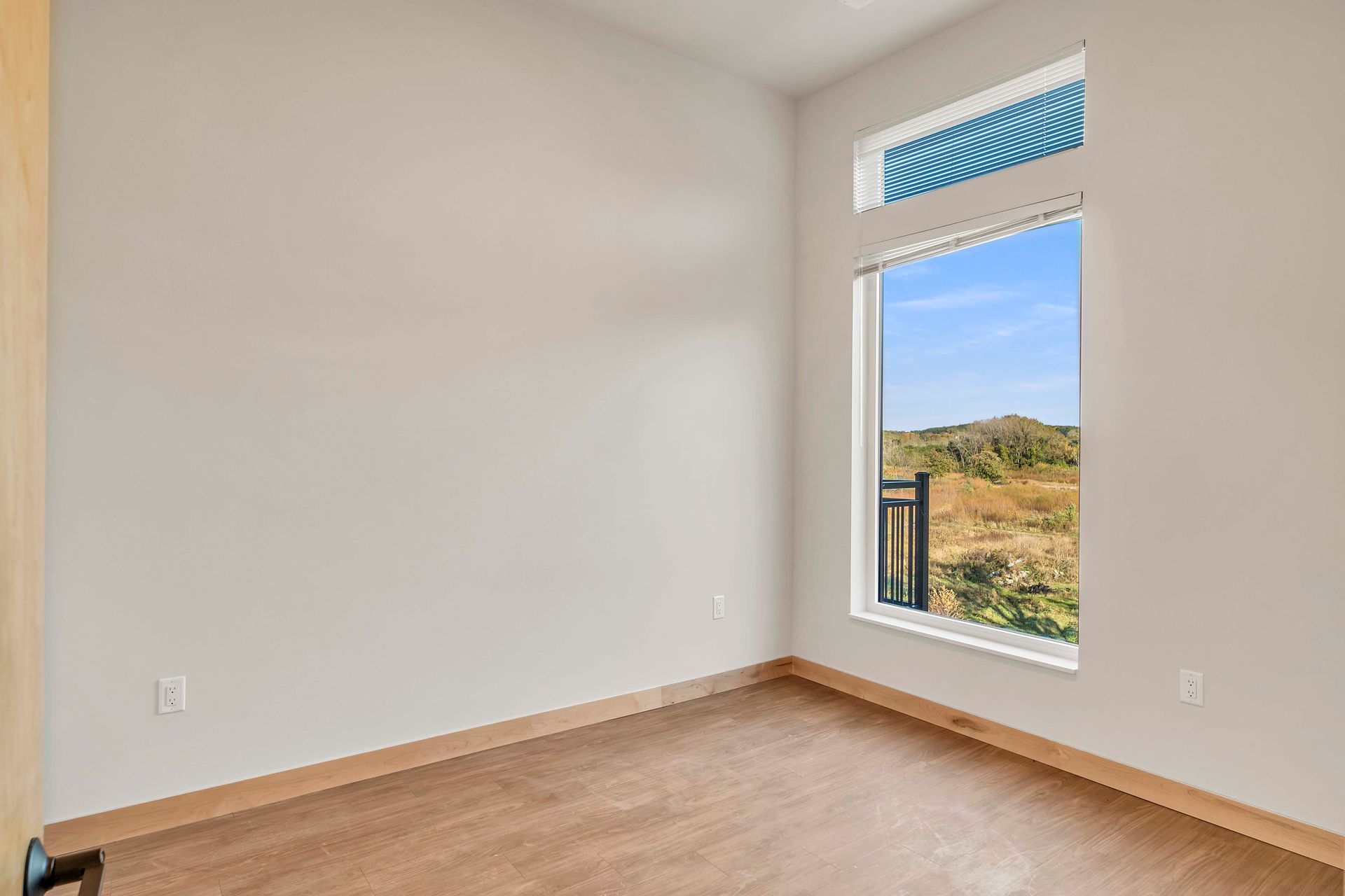 There is a large window in the middle of the room.