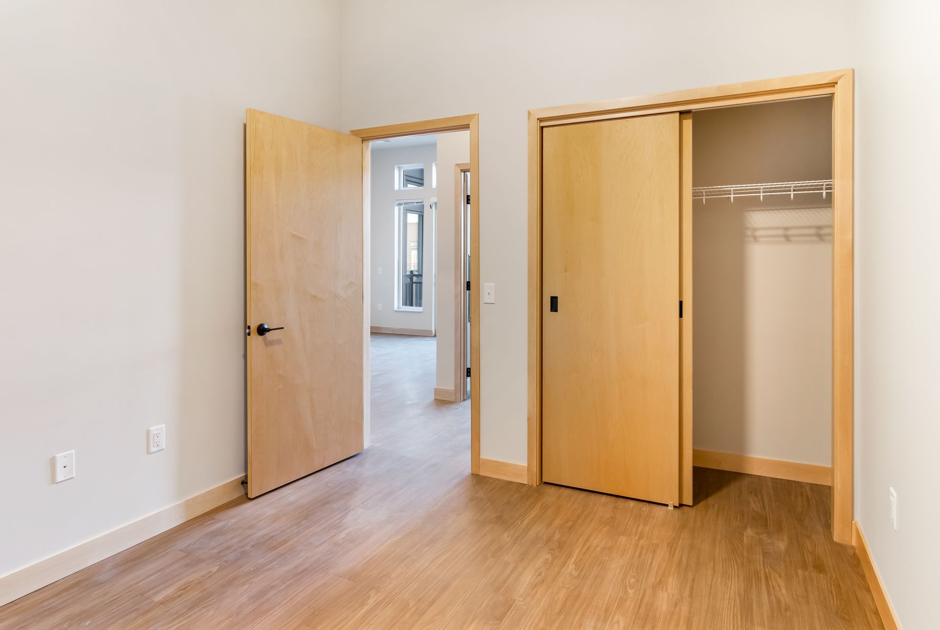 There is a closet in the middle of the room.