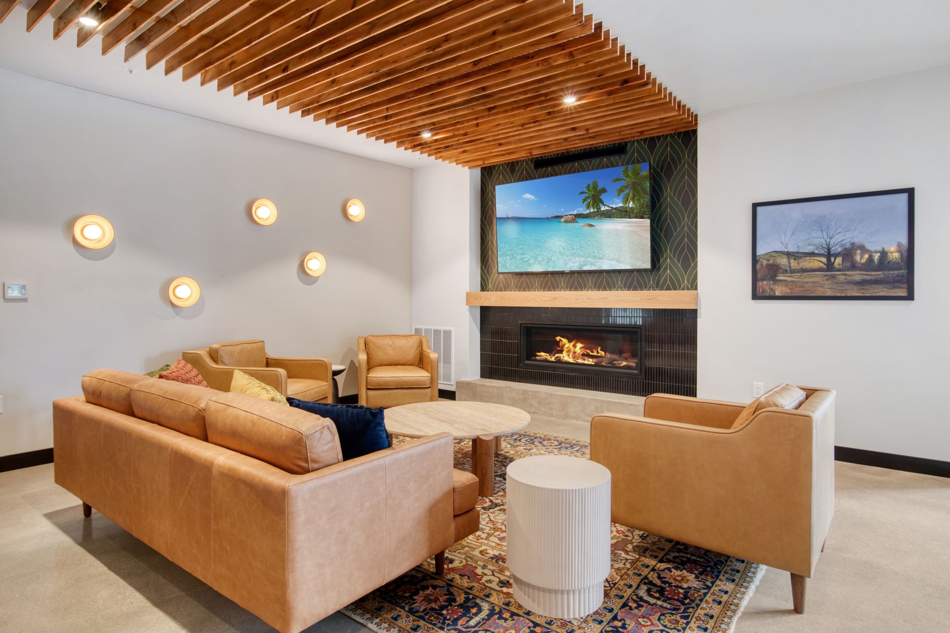 A living room filled with furniture and a fireplace.