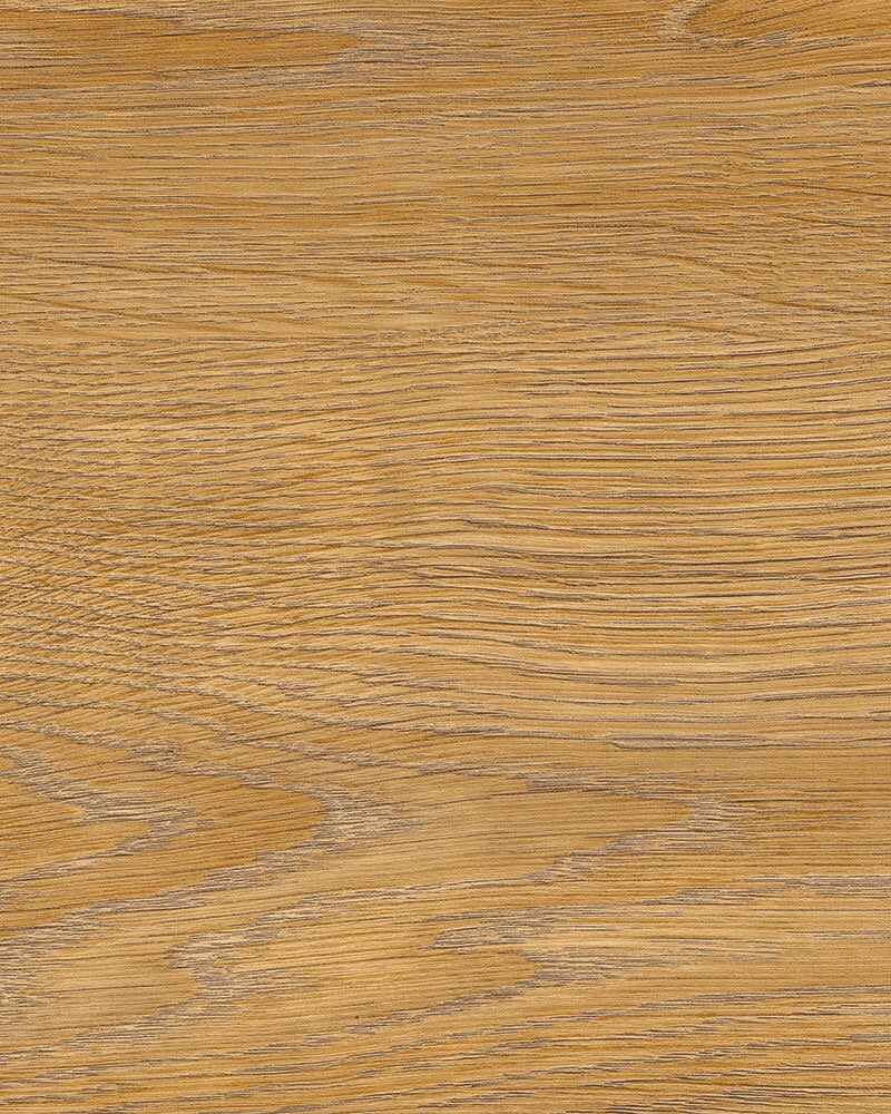 A close up of a piece of wood showing the grain and texture.