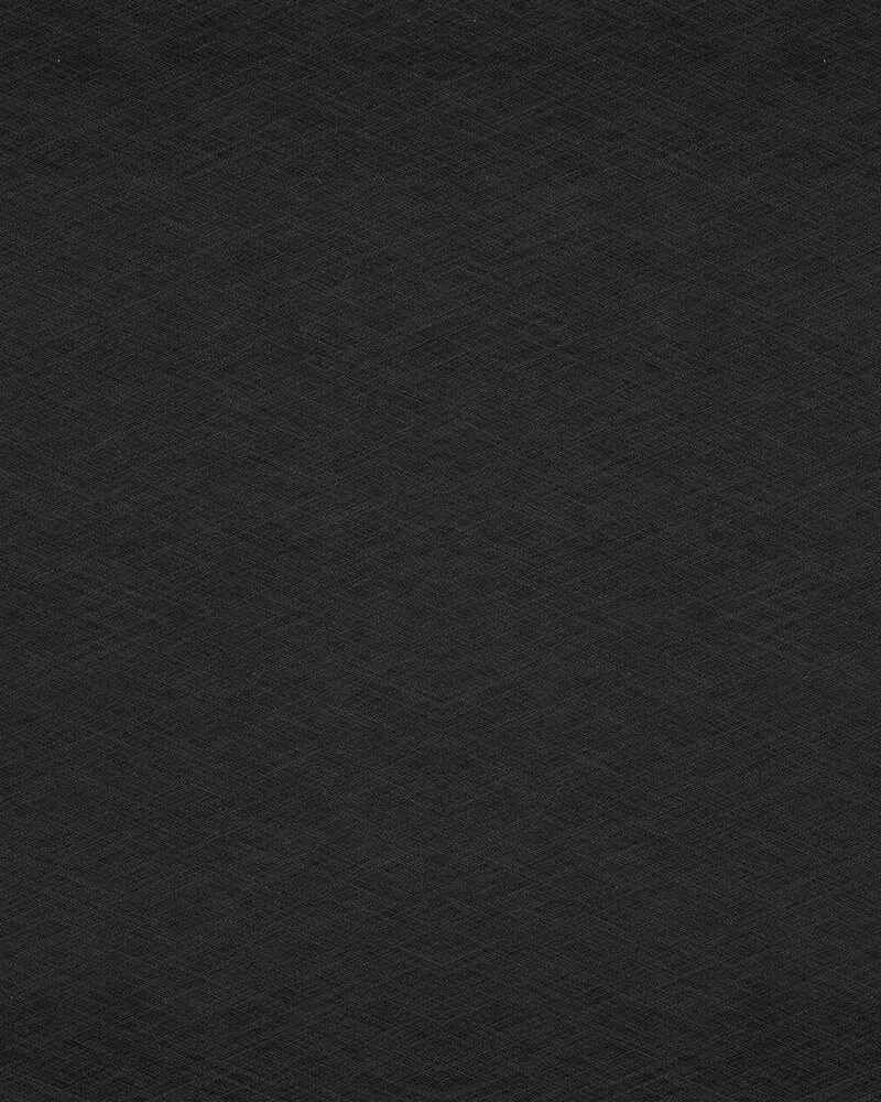 A close up of a black paper texture.