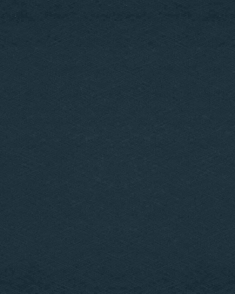 A close up of a dark blue fabric texture.