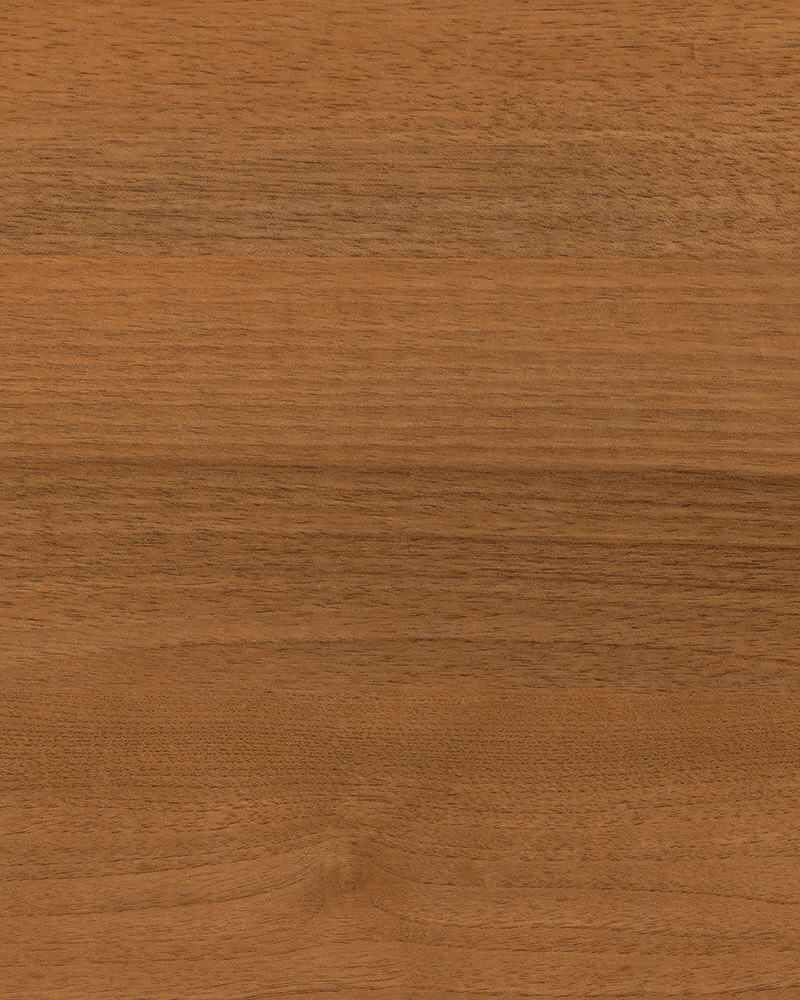 A close up of a piece of wood showing the grain and texture.