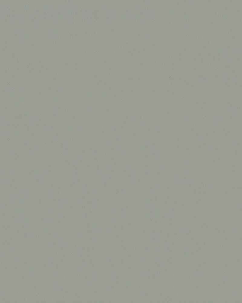 A close up of a gray paper texture.