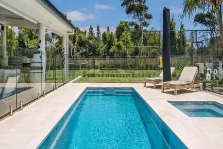 There Is A Large Swimming Pool In The Backyard Of A House β Evoke Pools In Lennox Head, NSW