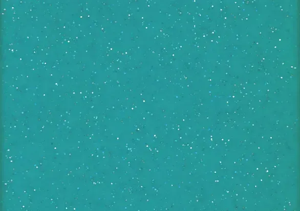 A close up of a blue background with white glitter.
