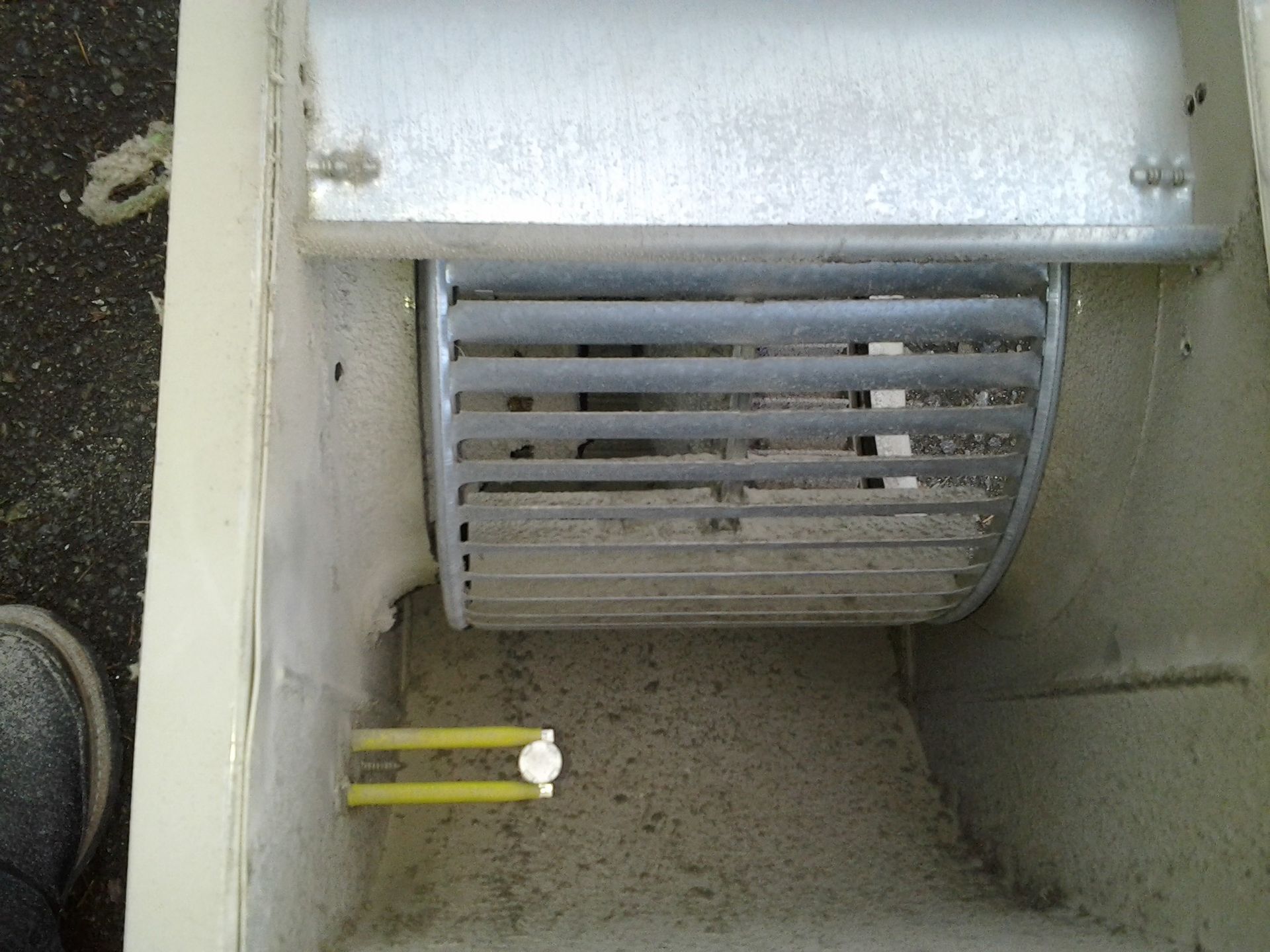 Dirty outdoor AC unit before Kings Heating maintenance cleaning service in Lynnwood WA