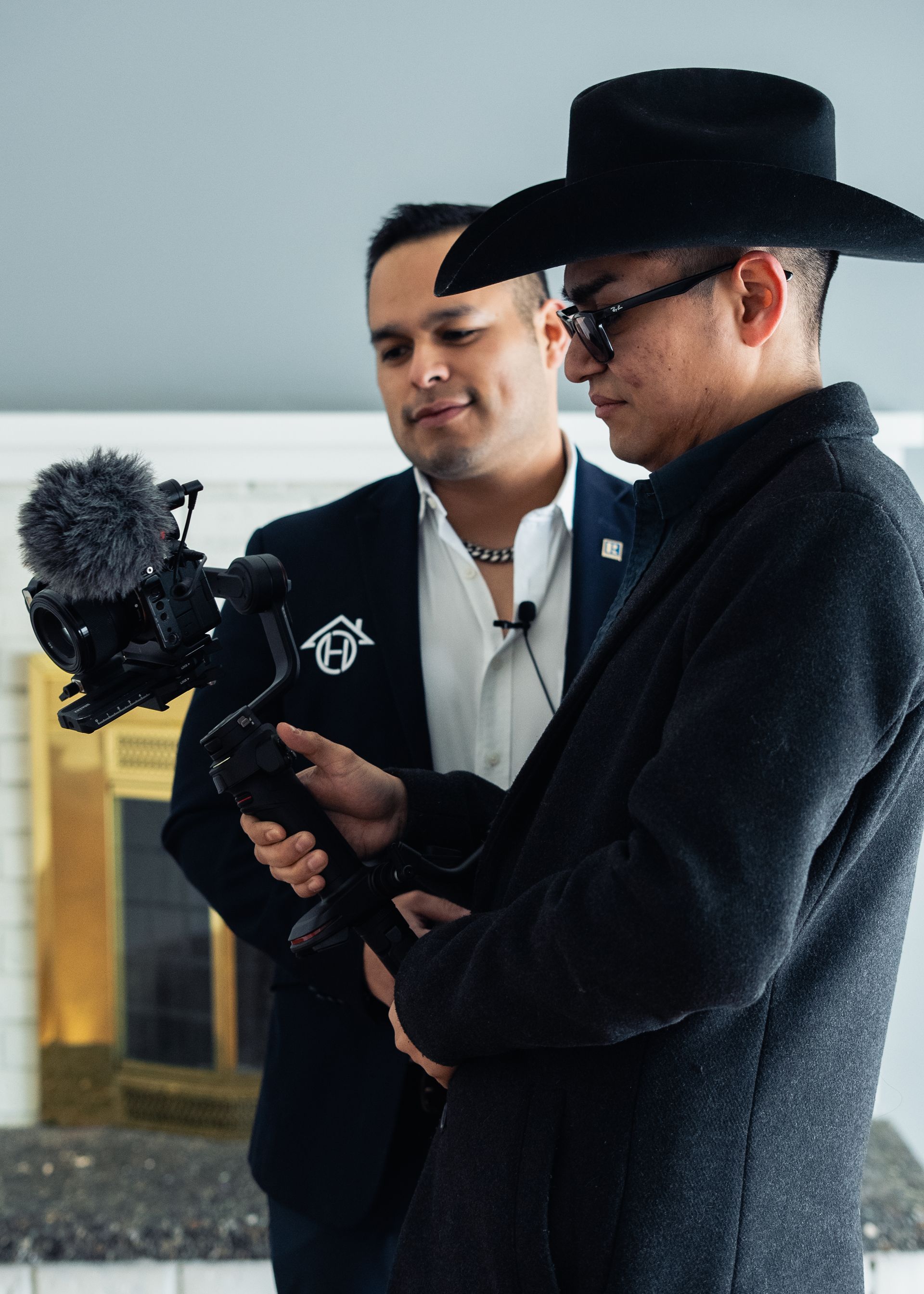 A vase of flowers is sitting on a table next to a window.