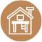 An icon of a house with a desk inside of it.