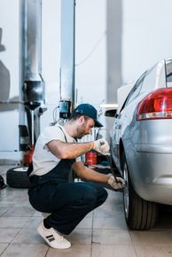 Mechanic Checking Tires/Wheels | Fix It Auto Repair