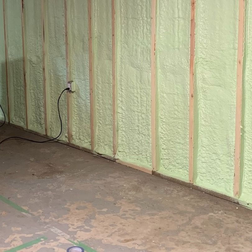 a room with foam insulation on the walls and floor .