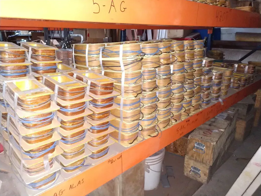 A warehouse filled with lots of containers of food including 5 ag