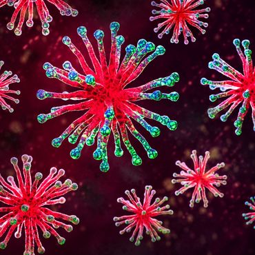 Un'immagine generata al computer di un virus che sembra un fuoco d'artificio