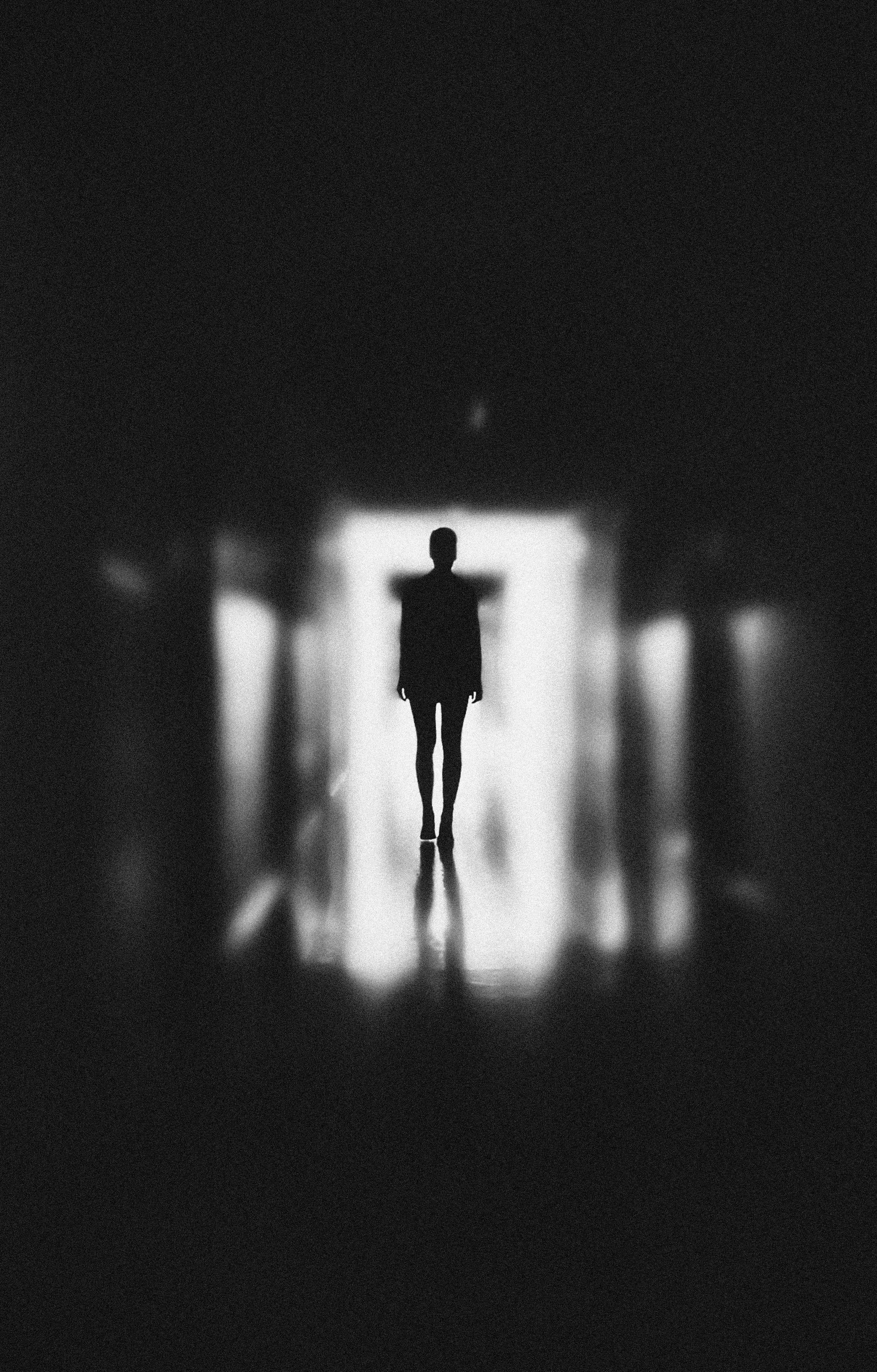 Person trapped in invisible glass cage while someone outside holds the key,
manipulation and control