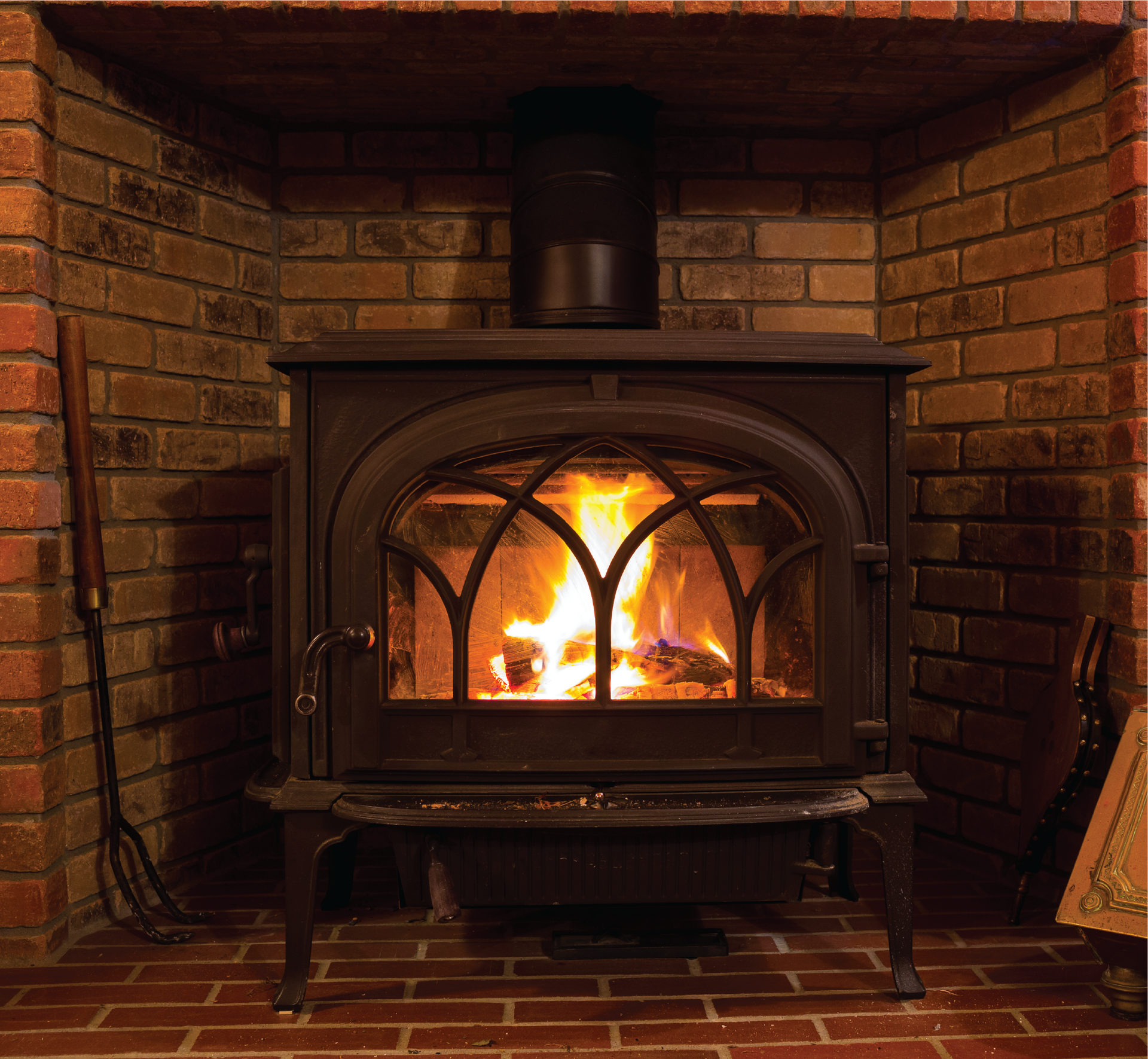 A fireplace with a wood stove in it