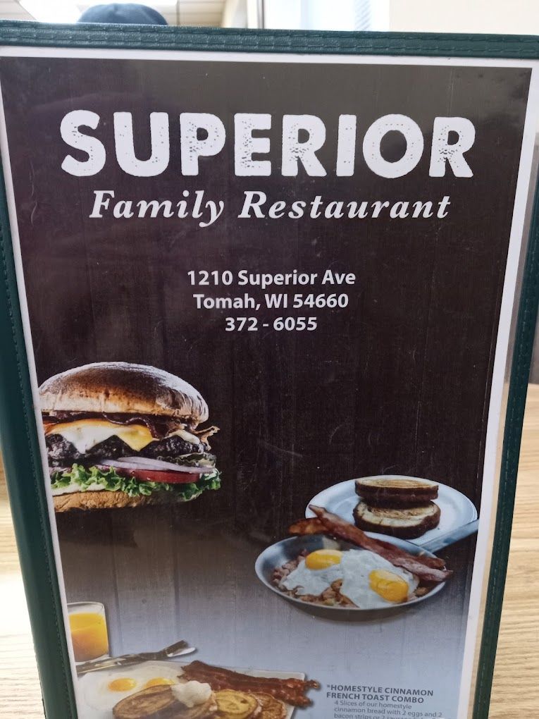 Superior Family Restaurant sign with burger, breakfast plate, and drink on a dark background
