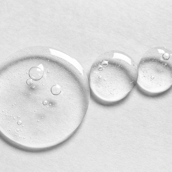 close up image of clear cosmetic serum