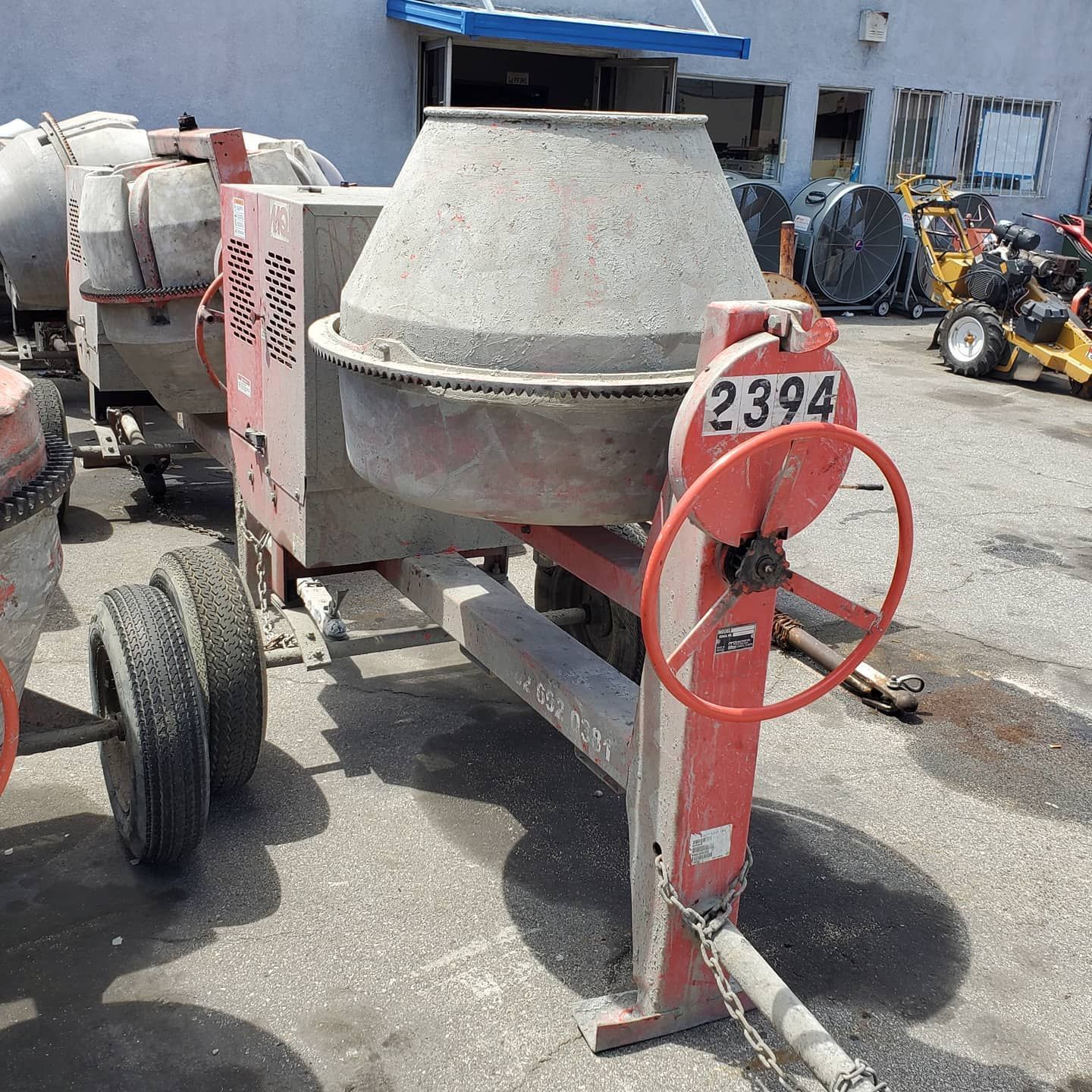 A concrete mixer with the number 2394 on it
