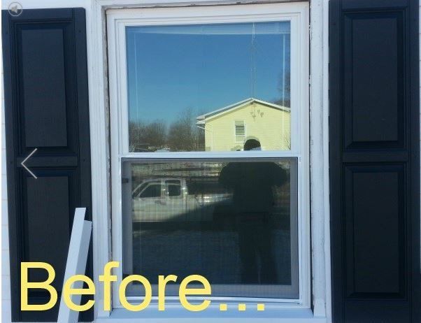 a before picture of a window with black shutters