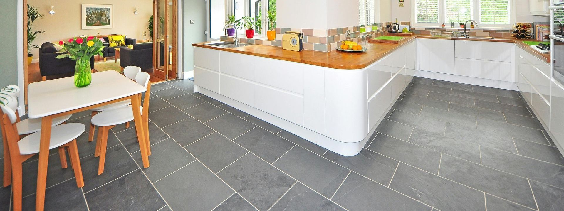 Kitchen with gray tile floors