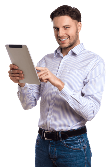 An individual holding a tablet computer and smiling.