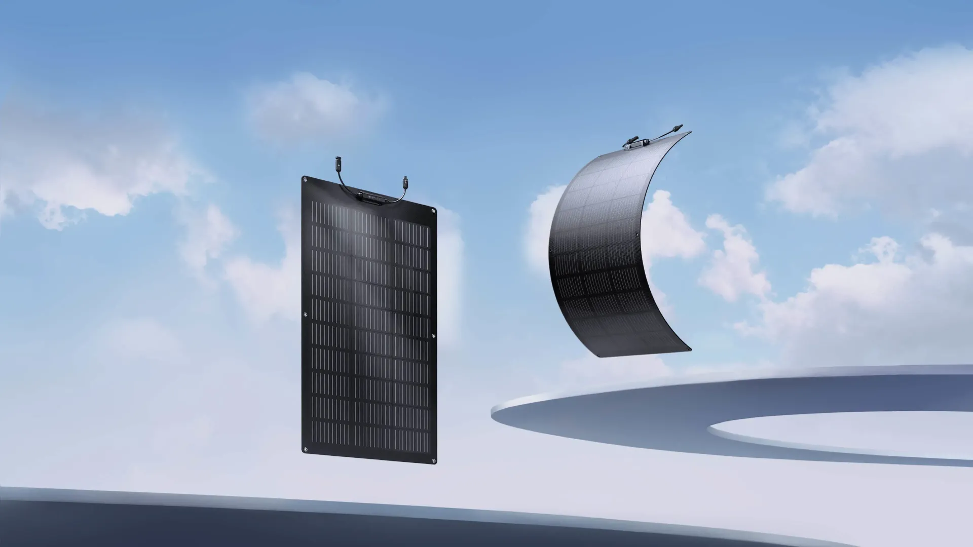 Flexible black solar panel with curved shape and connected wires.