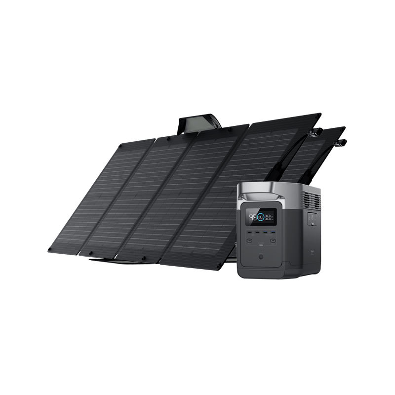 Black solar panel array with a gray portable power station on a white background.