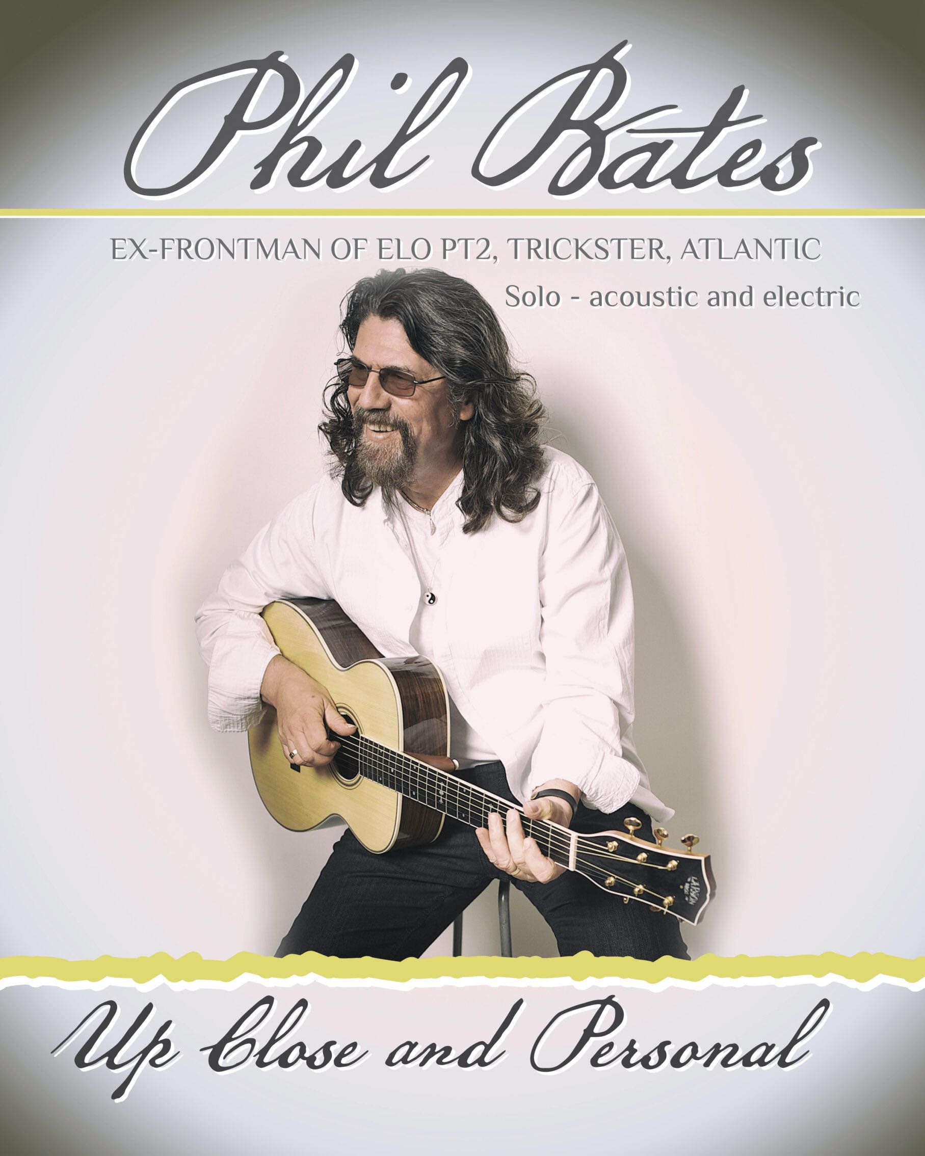Phil Bates album cover: man with curly hair playing guitar, titled 