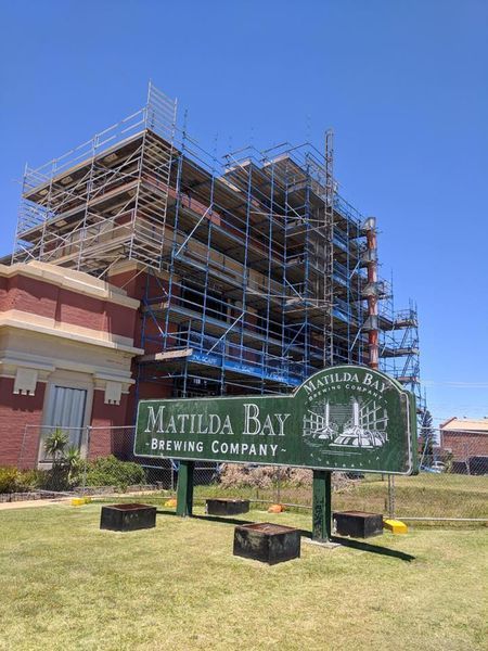 Scaffolding being installed at the construction site