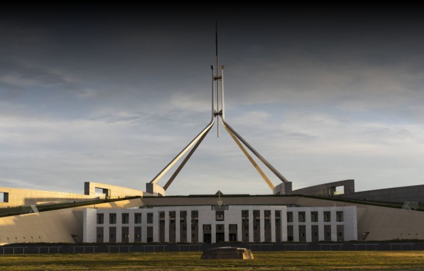 A large building with a very tall tower on top of it