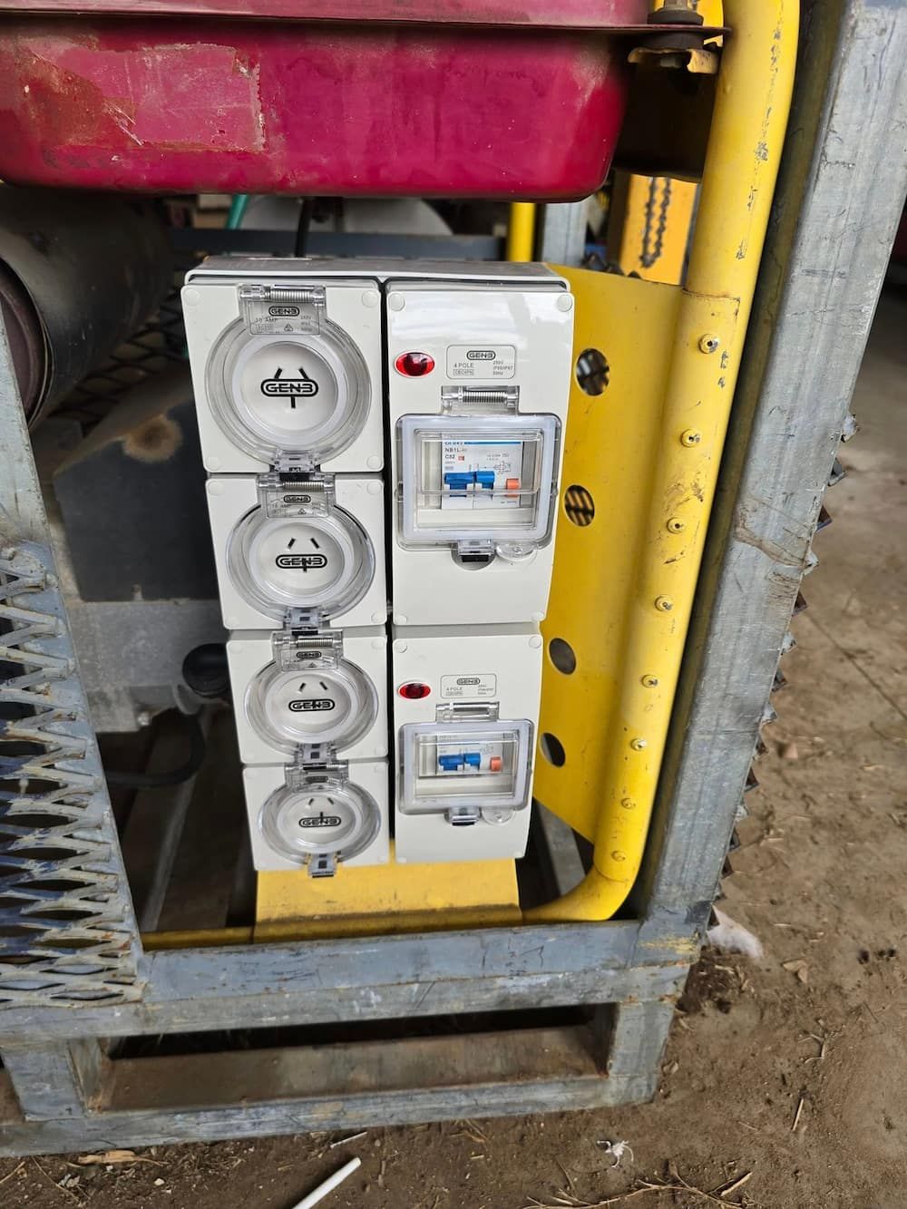 A Close Up of a Electrical Box With a Red Box in the Background— D.J. Whatley & Son Pty Ltd in Yatala, QLD