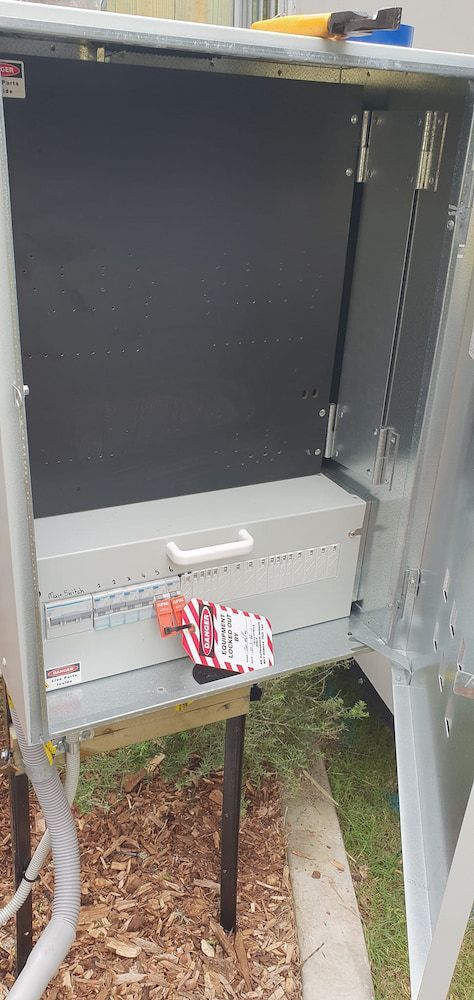 a Metal Box is Sitting on Top of a Wooden Table — D.J. Whatley & Son Pty Ltd in Pimpama, QLD