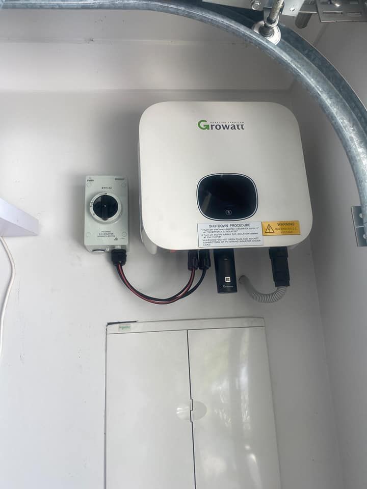 A growall solar panel is mounted on a wall. — D.J. Whatley & Son Pty Ltd in Coomera, QLD