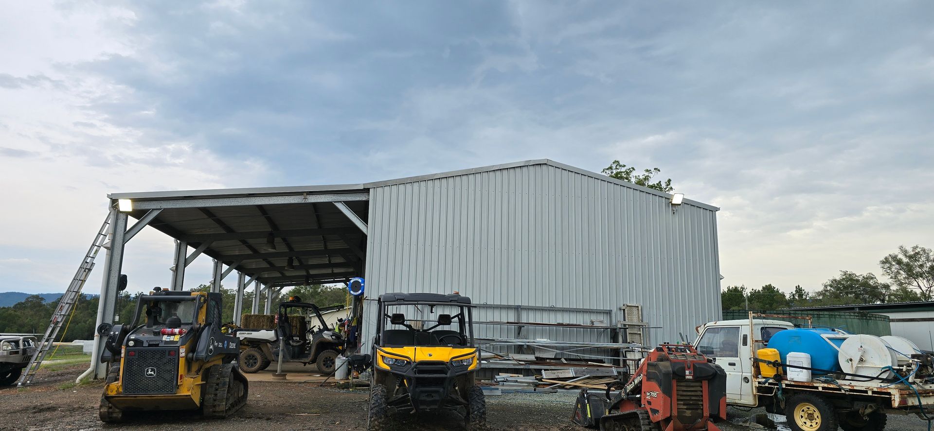 A Large Empty Room With a Pile of Trash on the Floor — D.J. Whatley & Son Pty Ltd in Ormeau Hills, QLD