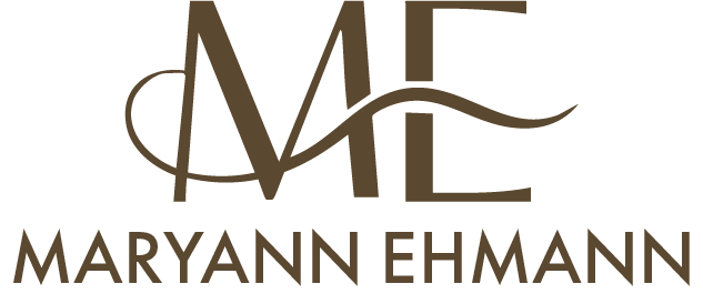 Maryann Ehmann logo in brown and beige with stylized ME initials and wavy line