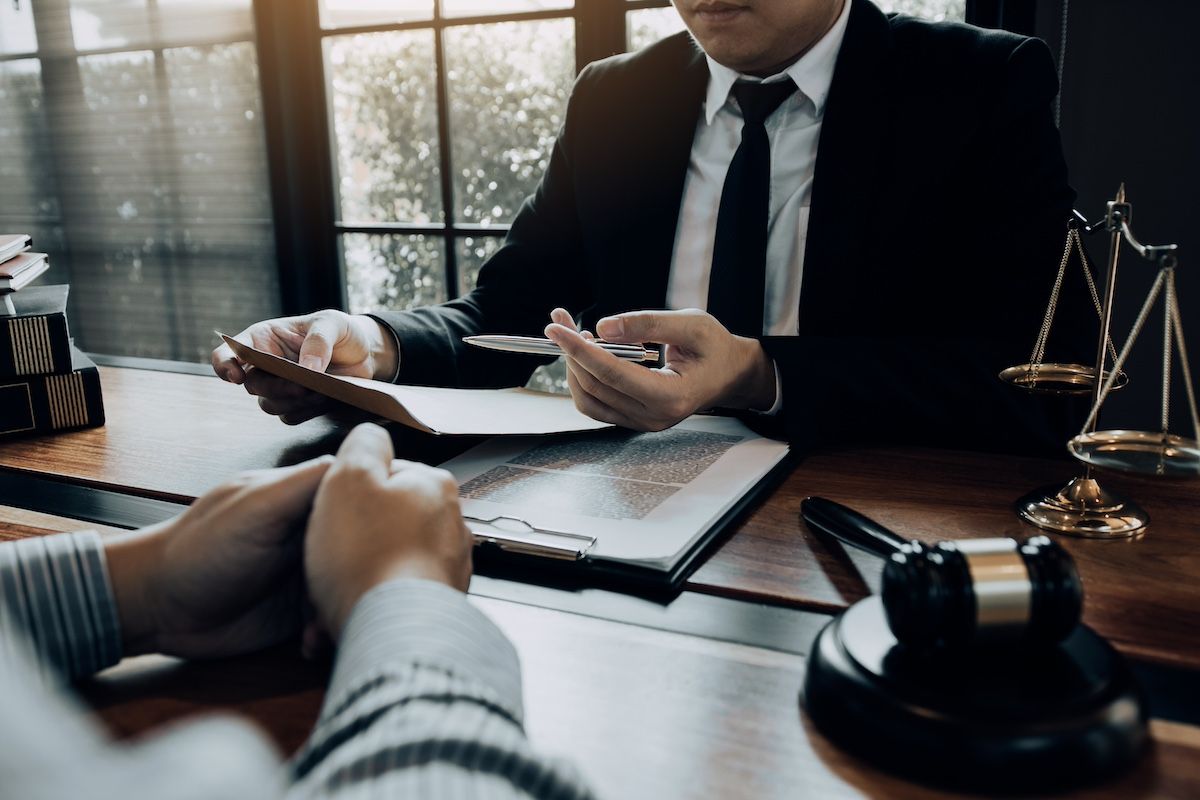 A Personal Injury Attorney Consults With a Potential Client. Contact Duckworth Injury Law.