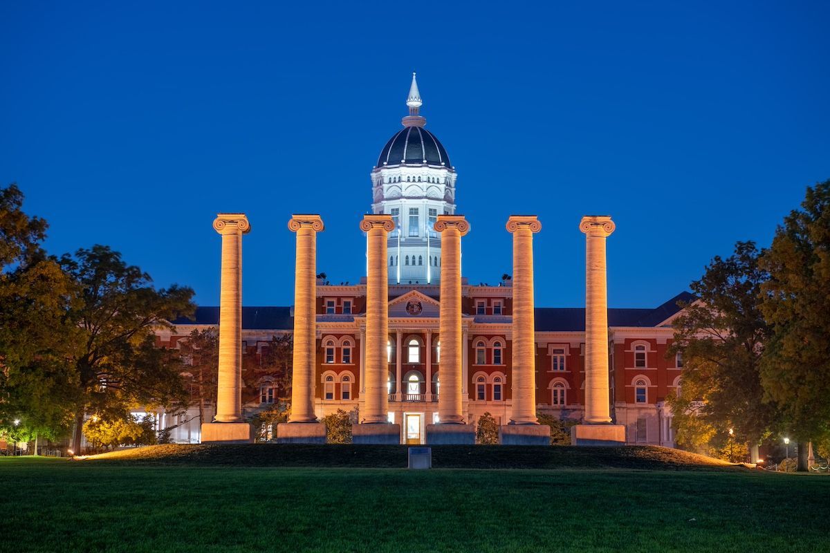 Columns & Jesse Hall at the University of Missouri Lit up in the Evening. Duckworth Serves Students.
