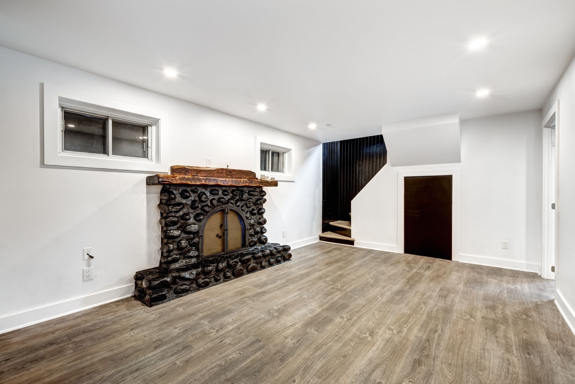 There is a fireplace in the middle of the room.