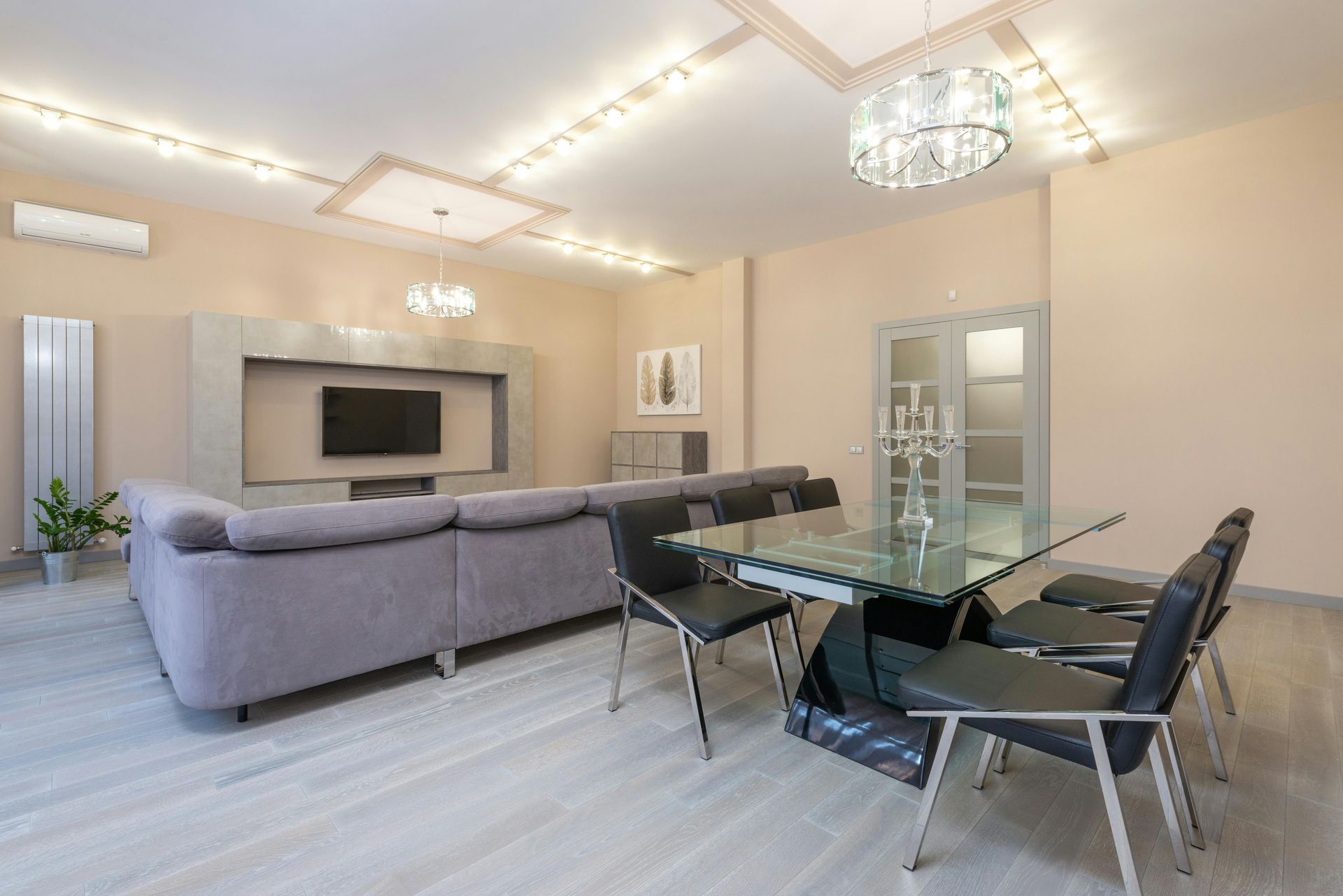 A stylish living room with an enhanced lighting system.