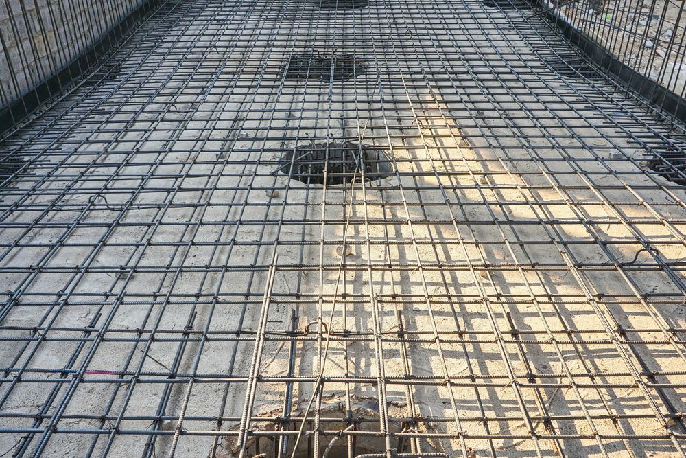 A Steel Rebar Grid Prepared for a Concrete Foundation — Complete Concreting Riverina In Ashmont, NSW