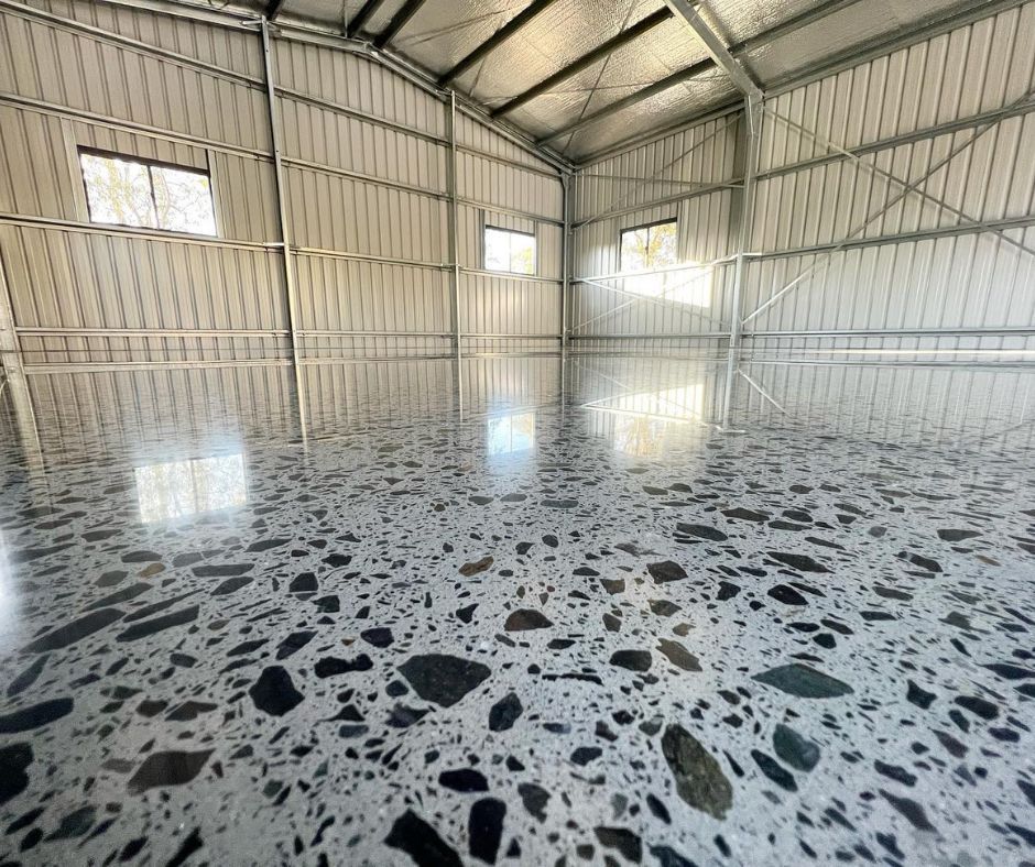 Smooth, glossy finish polished concrete flooring installed by Coulson's Concrete Finishes team