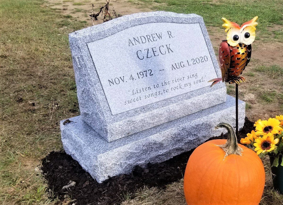 granite slant monument installed by Champlain Monuments