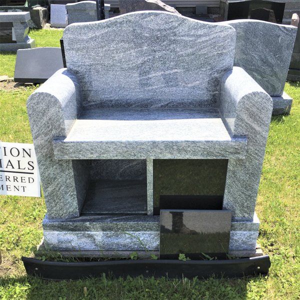 A granite columbarium bench installed by Champlain Monuments.