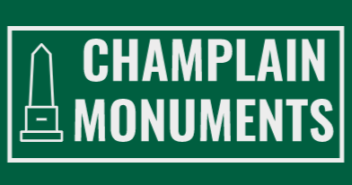 a green sign that says champlain monuments on it